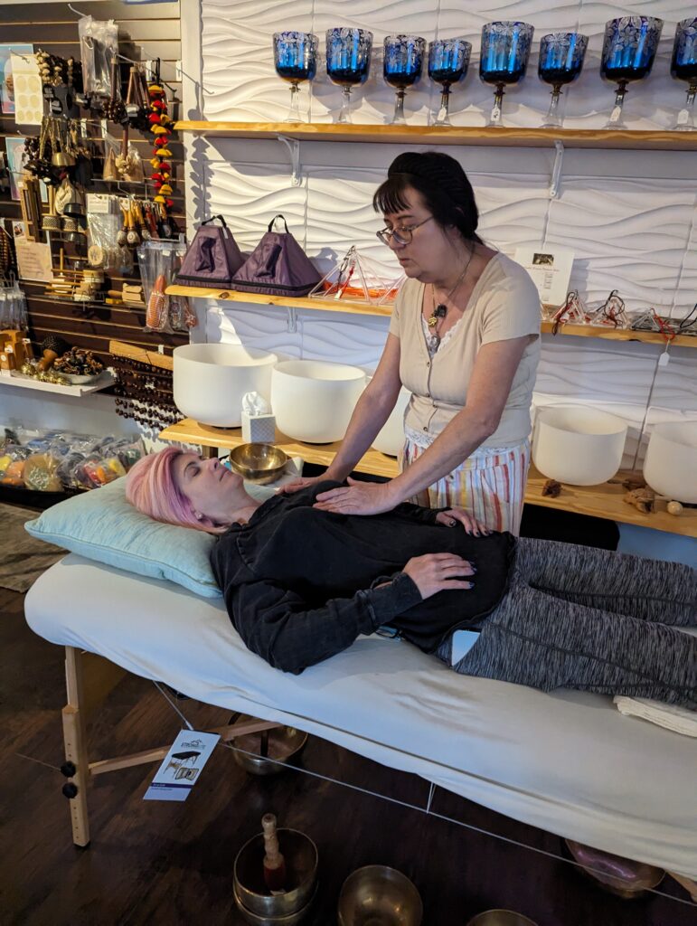 Student practicing sound healing at the om shoppe in sarasota floria